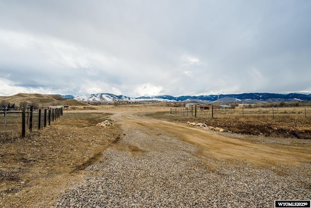 view of street featuring a mountain view and a rural view