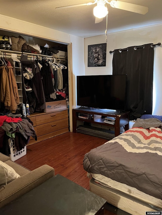 305 E Center St, Rawlins, WY 82301 - bedroom with ceiling fan, a closet, and wood finished floors
