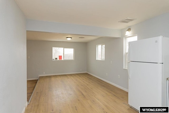 630 Ludvig St, Rock Springs, WY 82901 - interior space with light wood-style flooring, baseboards, and visible vents
