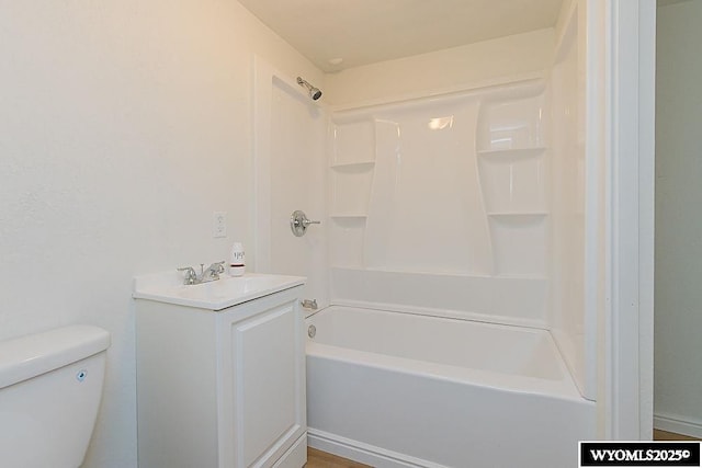 630 Ludvig St, Rock Springs, WY 82901 - full bathroom with toilet, vanity, and bathtub / shower combination