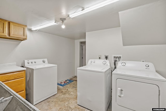 432 15th St, Evanston, WY 82930 - washroom featuring washer and clothes dryer and cabinet space