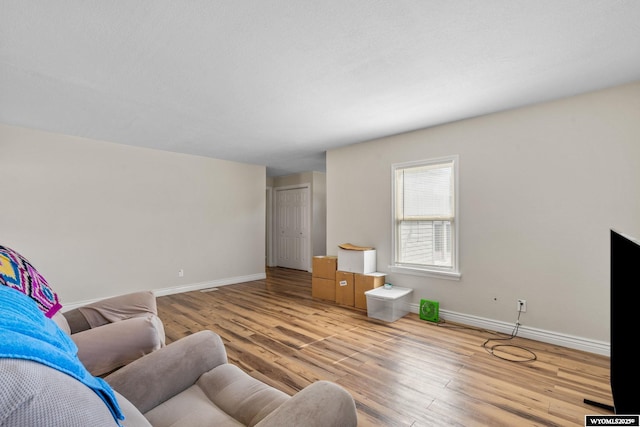 432 15th St, Evanston, WY 82930 - living area featuring light wood-style floors