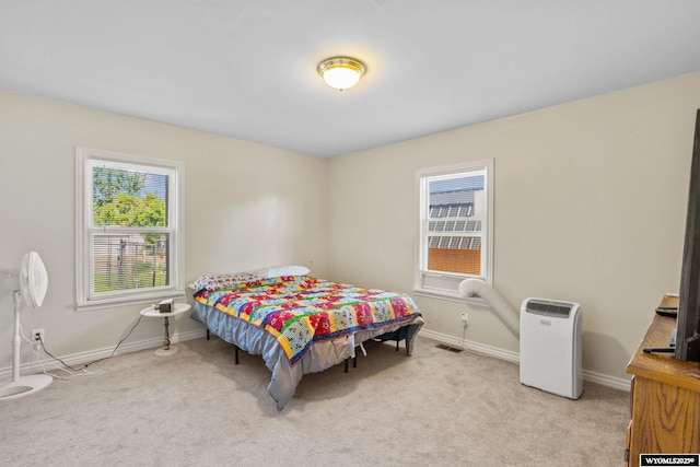 432 15th St, Evanston, WY 82930 - bedroom with light carpet