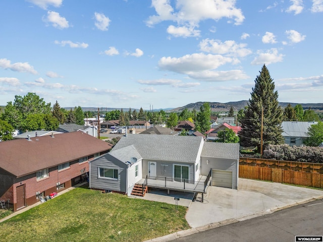 432 15th St, Evanston, WY 82930 - aerial view of residential area featuring mountains