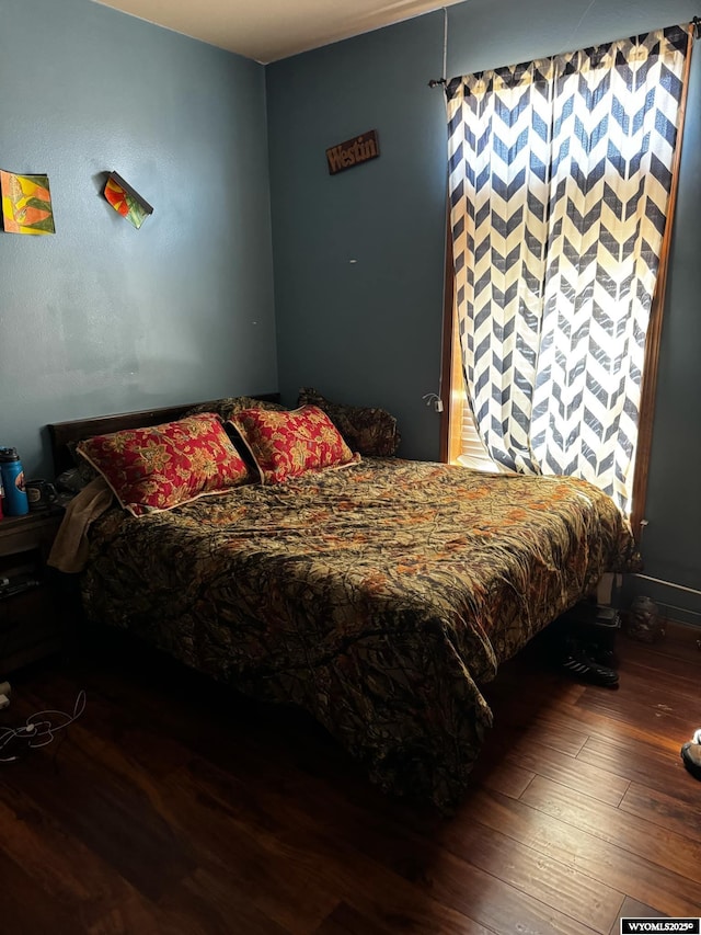 2720 State Highway 414 N, Lyman, WY 82937 - bedroom with wood-type flooring