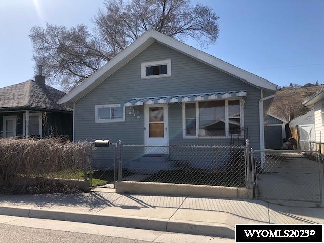 816 Center St, Rock Springs, WY 82901 - bungalow-style home featuring a gate and a fenced front yard
