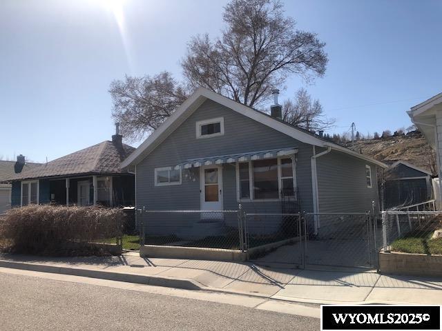 816 Center St, Rock Springs, WY 82901 - bungalow featuring fence and a gate