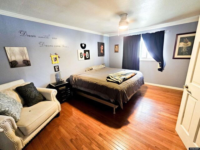 3617 Bighorn St, Torrington, WY 82240 - bedroom with hardwood / wood-style floors and ornamental molding