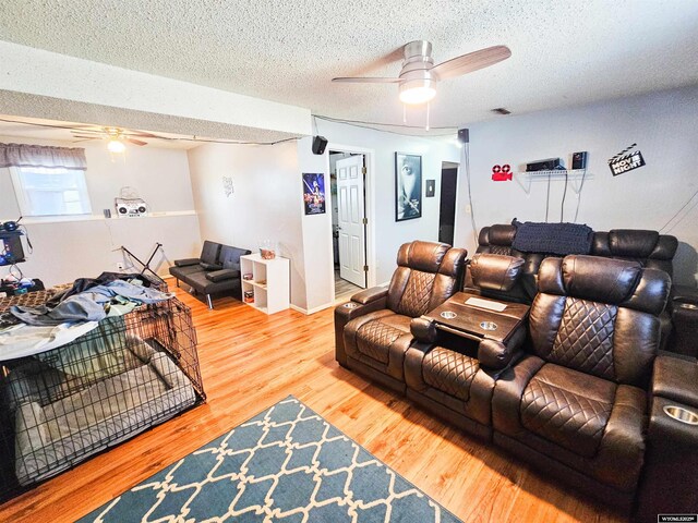 3617 Bighorn St, Torrington, WY 82240 - living area featuring ceiling fan, wood finished floors, and a textured ceiling
