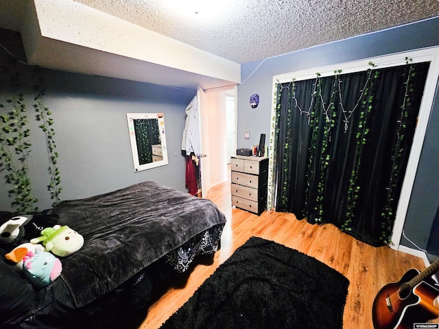 3617 Bighorn St, Torrington, WY 82240 - bedroom featuring wood finished floors and a textured ceiling