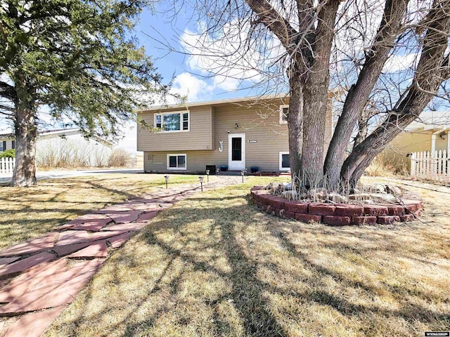 3617 Bighorn St, Torrington, WY 82240 - back of property with a yard and fence