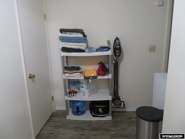 1001 Cheshire St, Casper, WY 82609 - clothes washing area featuring baseboards, laundry area, and wood finished floors
