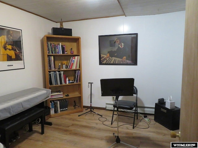 1001 Cheshire St, Casper, WY 82609 - sitting room featuring ornamental molding, wood finished floors, and baseboard heating