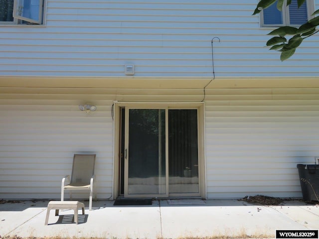 1001 Cheshire St, Casper, WY 82609 - view of exterior entry with a patio area