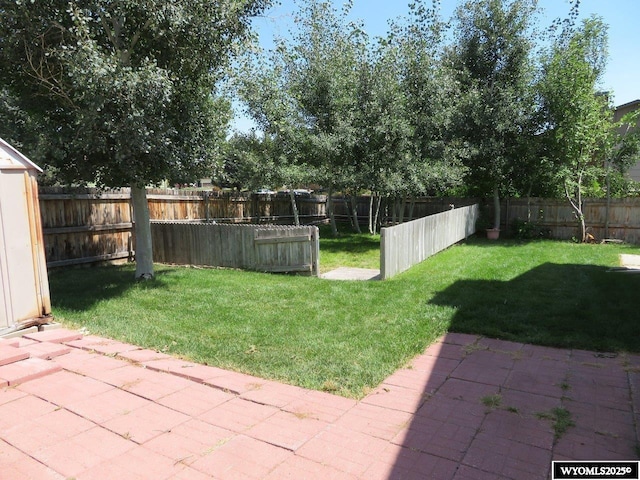 1001 Cheshire St, Casper, WY 82609 - view of yard featuring a patio area and a fenced backyard