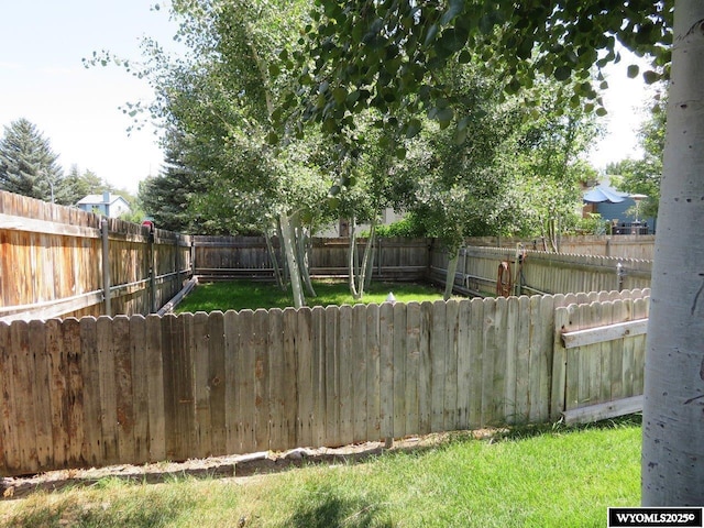 1001 Cheshire St, Casper, WY 82609 - view of yard featuring a fenced backyard