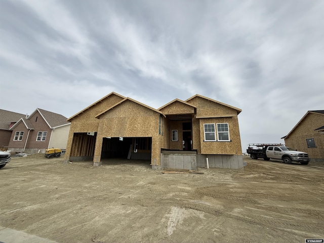 2701 Bailey Blvd, Rock Springs, WY 82901 - unfinished property featuring a garage and stucco siding