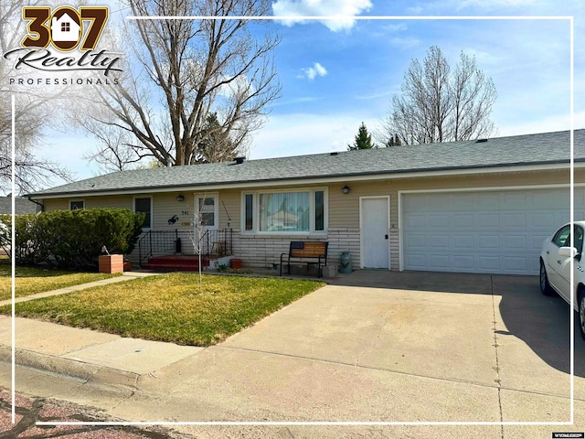 341 E 29th Ave, Torrington, WY 82240 - single story home featuring an attached garage, a shingled roof, driveway, and a front yard