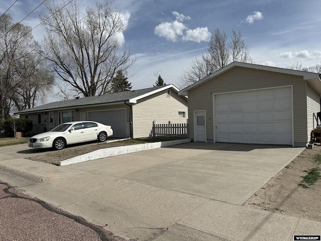 341 E 29th Ave, Torrington, WY 82240 - exterior space featuring an outbuilding, fence, and driveway