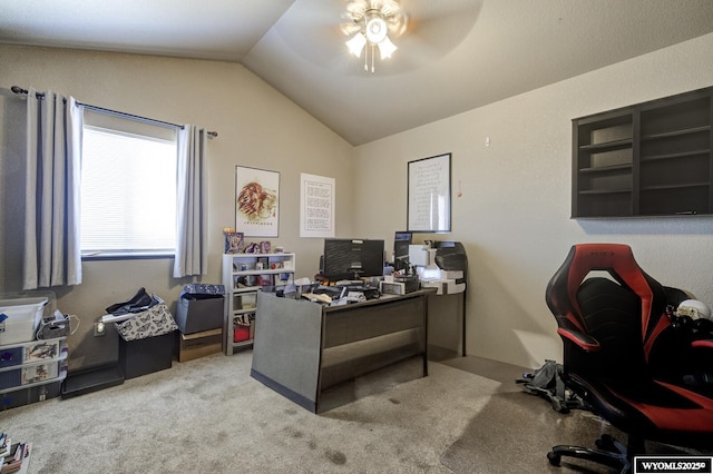 office space with a ceiling fan, lofted ceiling, and carpet floors