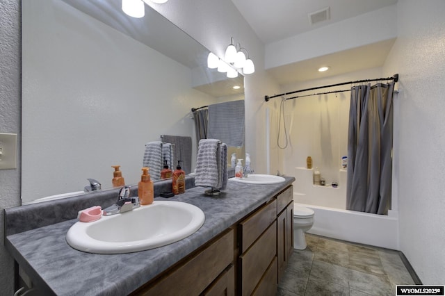 bathroom featuring a sink, visible vents, shower / tub combo with curtain, and double vanity