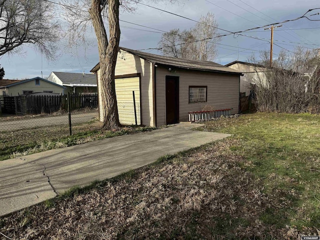 view of outdoor structure with fence