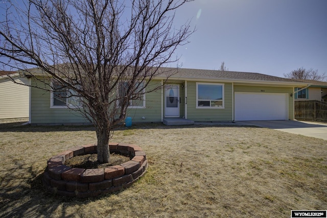 ranch-style home with concrete driveway, a front lawn, fence, and an attached garage