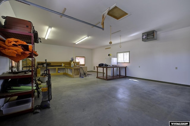 garage featuring baseboards