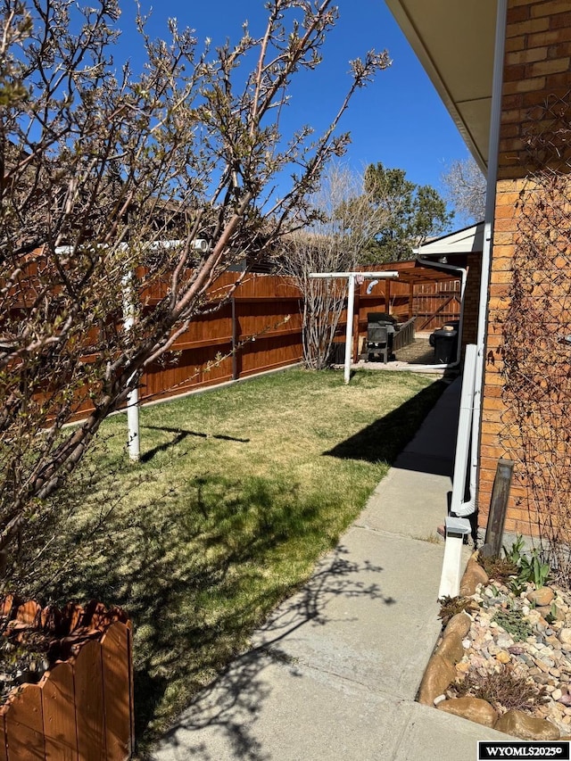 view of yard featuring fence