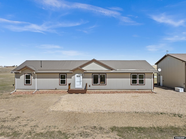 view of front of house featuring metal roof