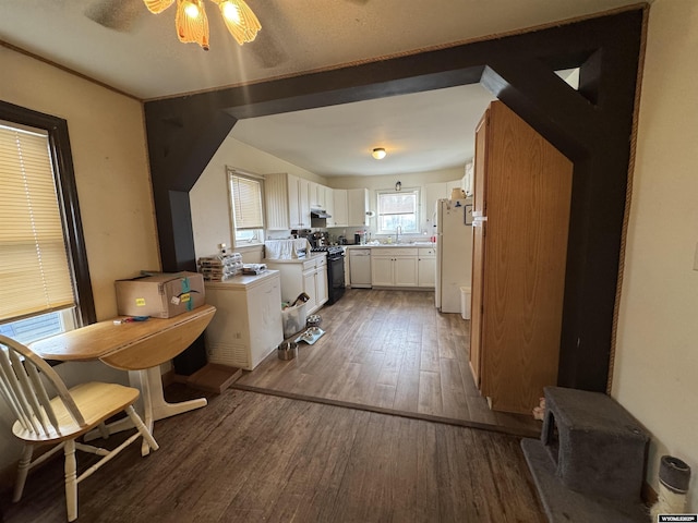 117 W Madison, Riverton, WY 82501 - kitchen featuring ceiling fan, freestanding refrigerator, white cabinetry, wood finished floors, and gas stove