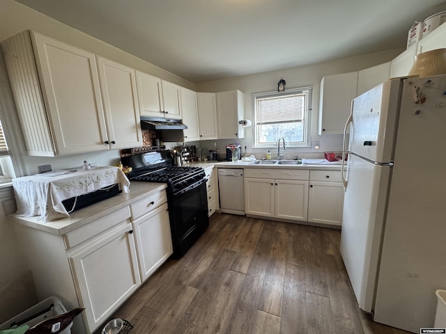 117 W Madison, Riverton, WY 82501 - kitchen featuring a sink, white cabinets, white appliances, and dark wood-style flooring