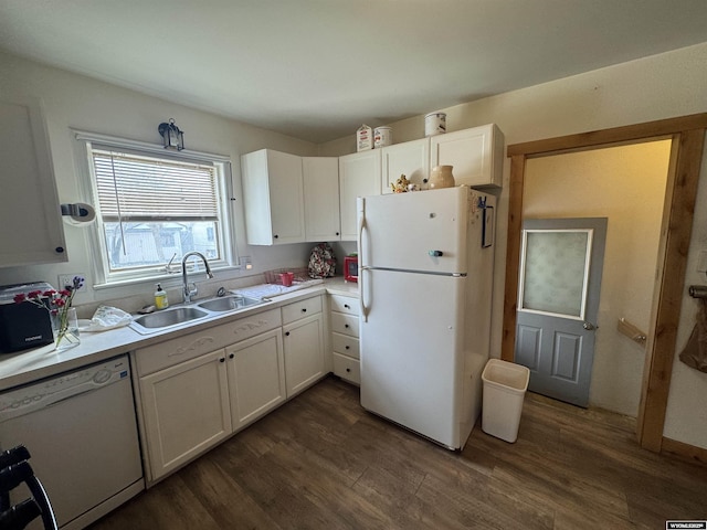 117 W Madison, Riverton, WY 82501 - kitchen featuring white appliances, light countertops, white cabinetry, dark wood-type flooring, and a sink
