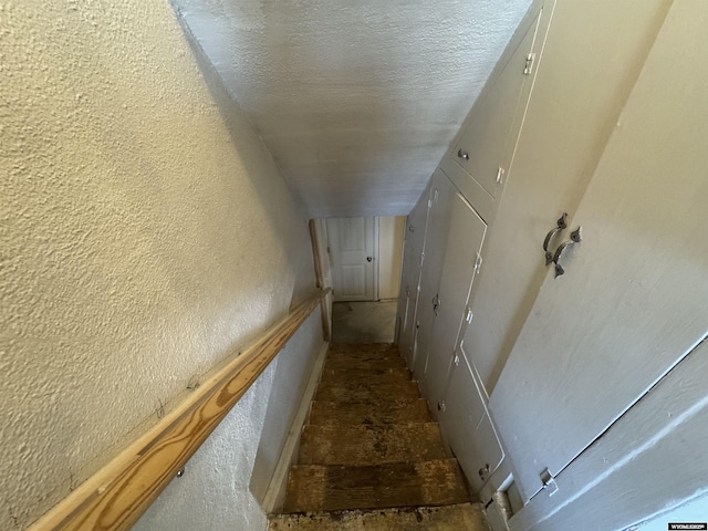 117 W Madison, Riverton, WY 82501 - staircase featuring a textured wall