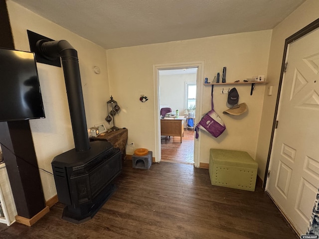 117 W Madison, Riverton, WY 82501 - hall featuring dark wood-style flooring and baseboards
