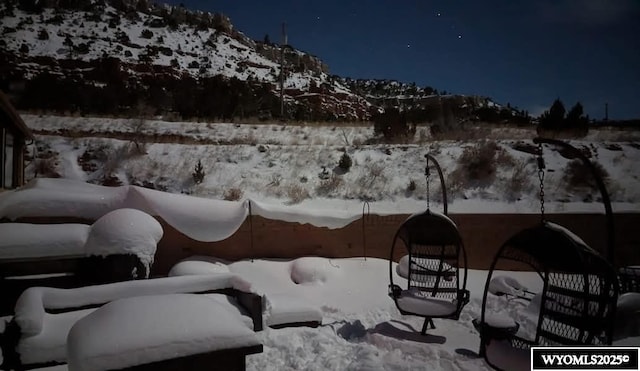 view of yard covered in snow