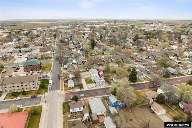 birds eye view of property with a residential view