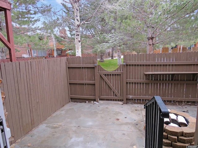 view of patio / terrace with a gate and fence private yard