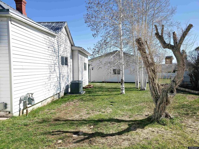 view of yard featuring central AC unit