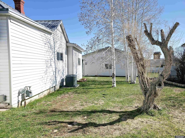 view of yard with central AC