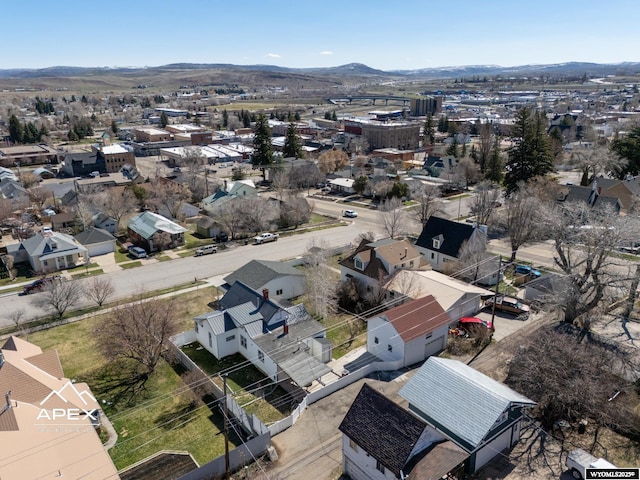 birds eye view of property featuring a mountain view and a residential view