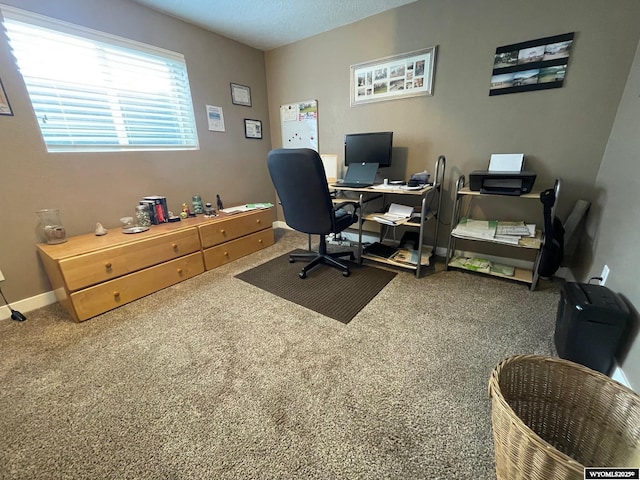 home office with baseboards and carpet