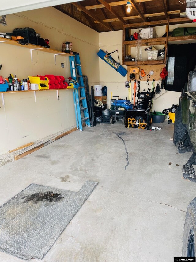 garage featuring a garage door opener