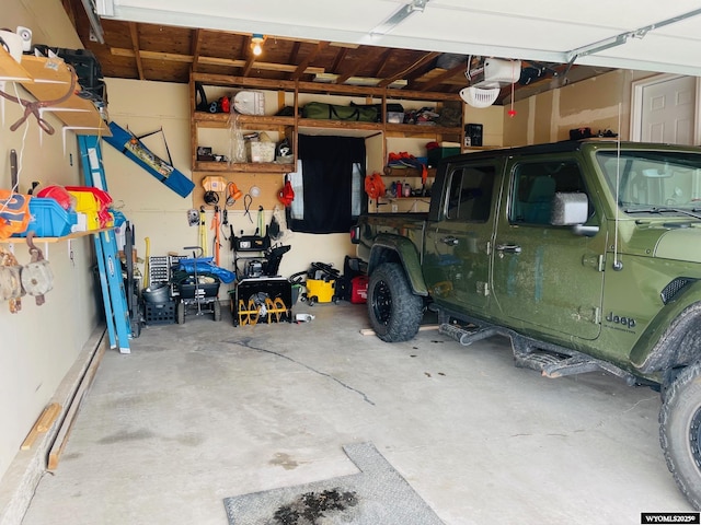 garage featuring a garage door opener