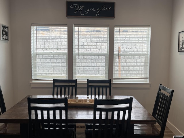 640 Lynn Ct, Green River, WY 82935 - dining space featuring wood finished floors and a wealth of natural light