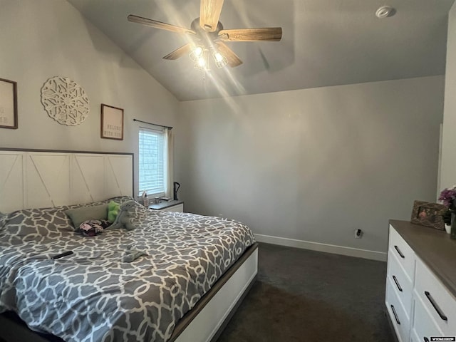 640 Lynn Ct, Green River, WY 82935 - bedroom featuring dark colored carpet, baseboards, vaulted ceiling, and ceiling fan