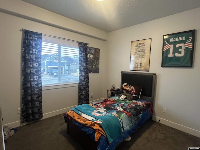 640 Lynn Ct, Green River, WY 82935 - bedroom featuring carpet flooring and baseboards
