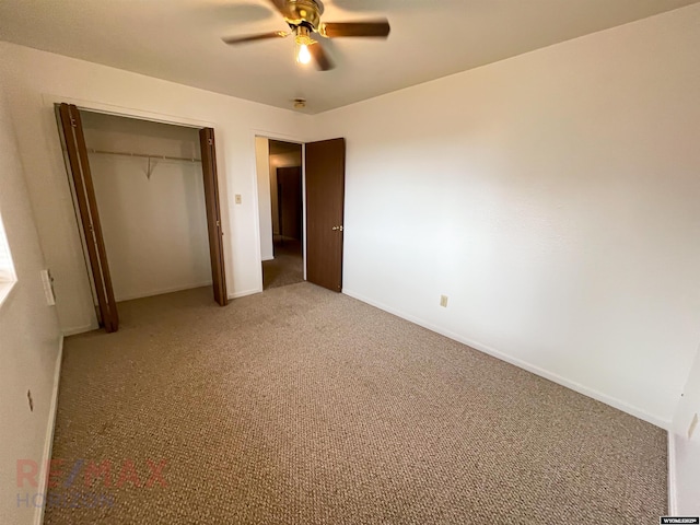 unfurnished bedroom with light carpet, baseboards, a closet, and ceiling fan