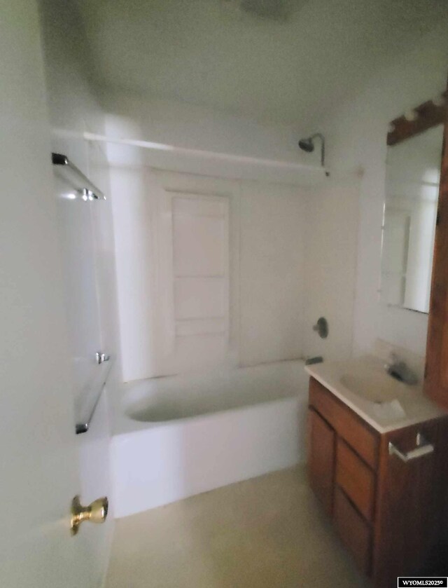 full bathroom featuring bathtub / shower combination and vanity