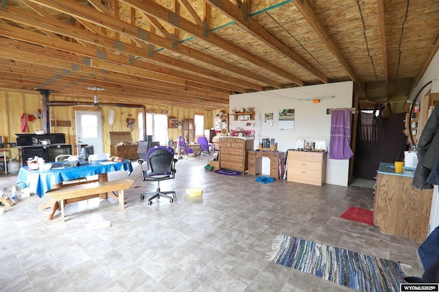 miscellaneous room featuring a wood stove